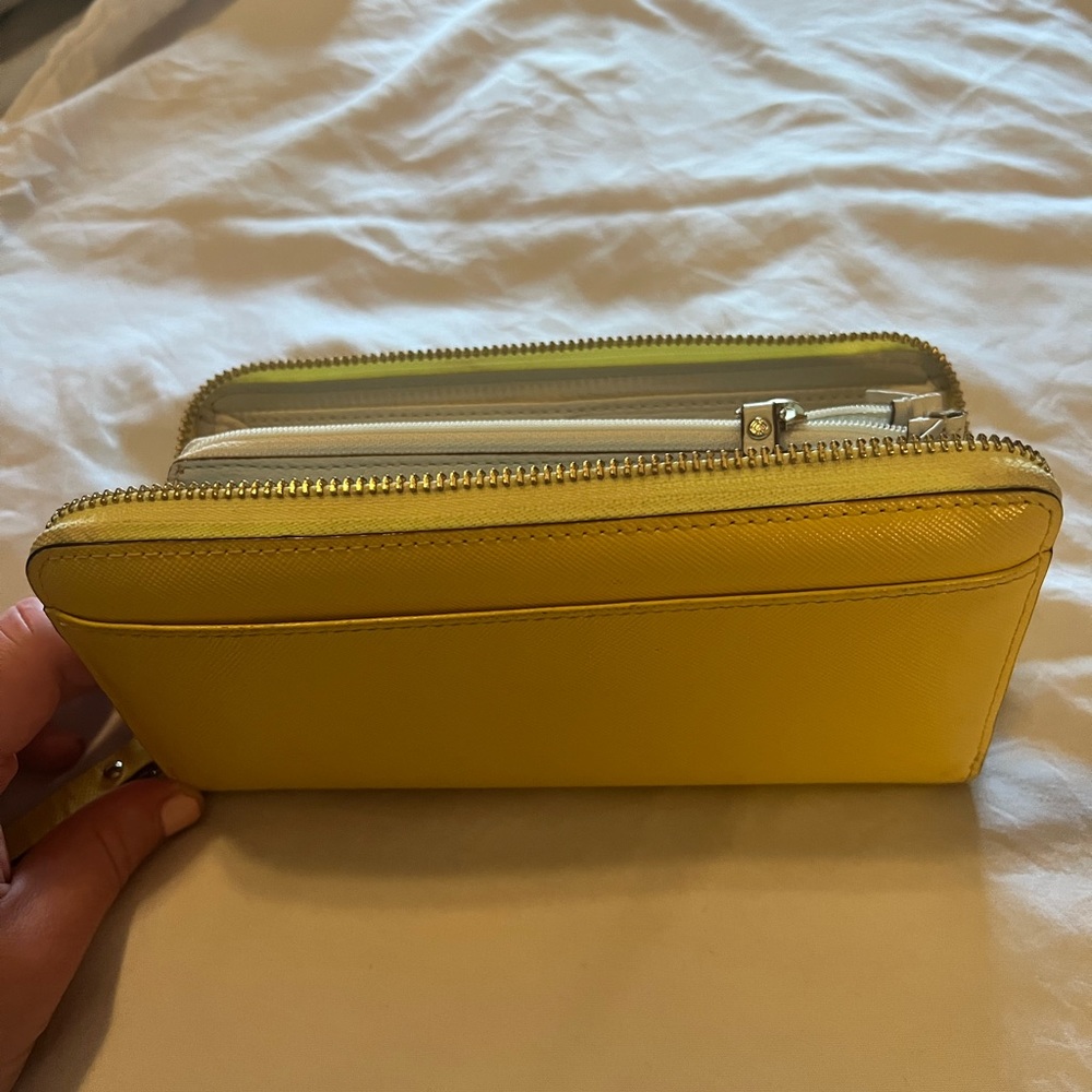 Classic Kate Spade Yellow bi-fold wallet in amazing condition!